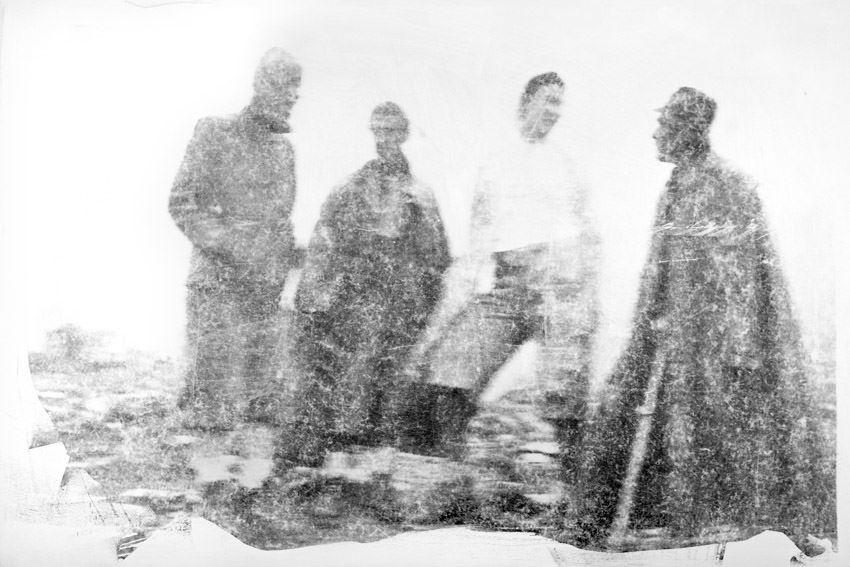 Ein Gruppe Wanderer am Berggipfel